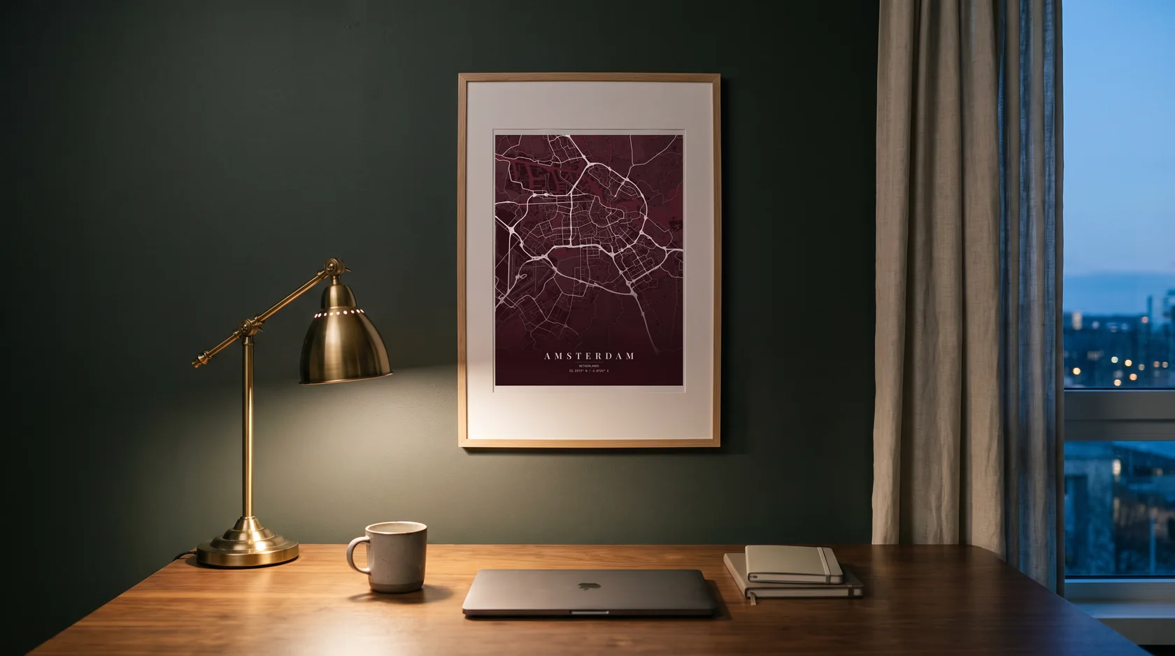 An Amsterdam poster in Oxblood Velvet, framed above a walnut desk